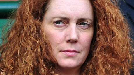 Eight charged in phone hacking scandal